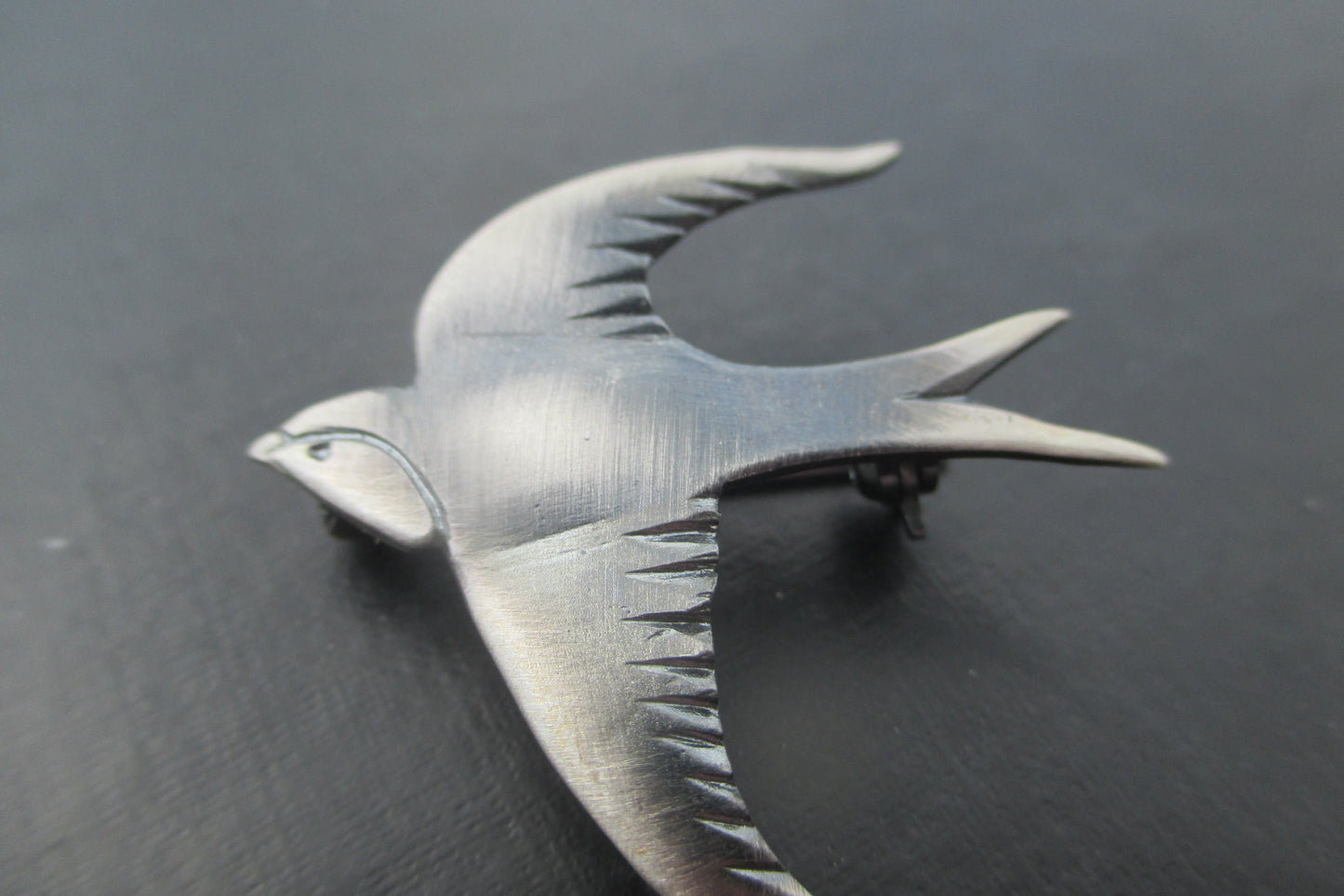 Bird broach