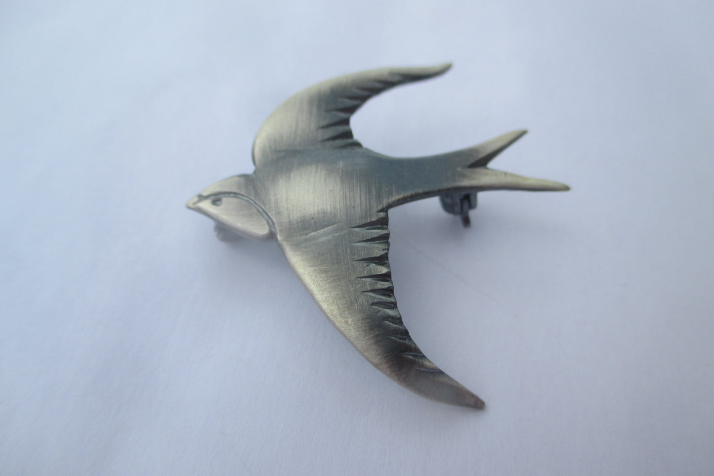 Bird broach