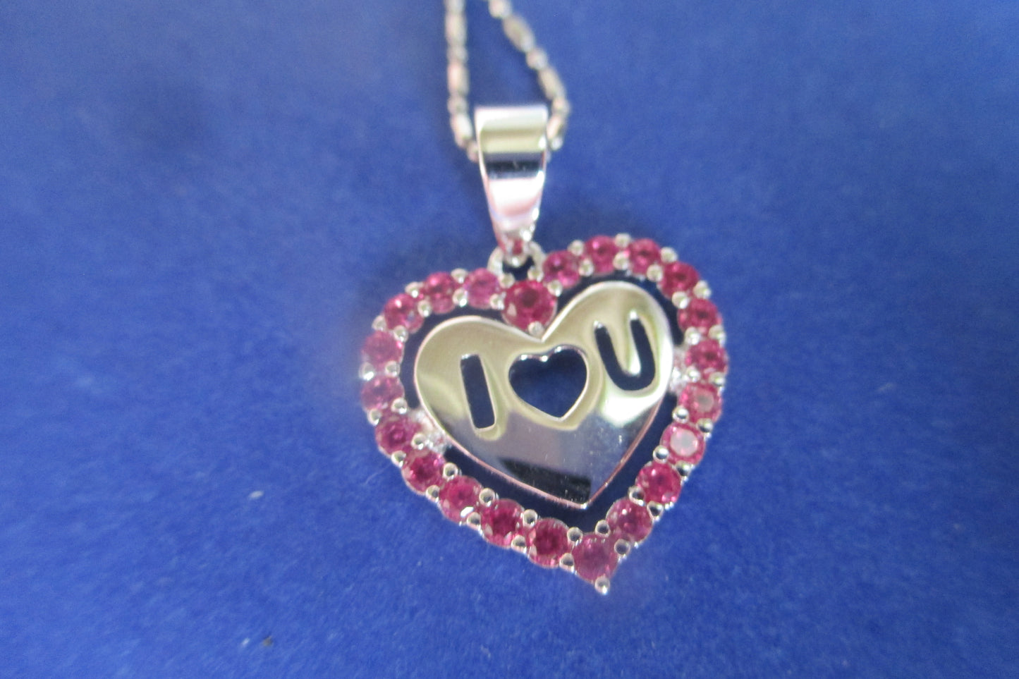 Silver heart with red accents pendant