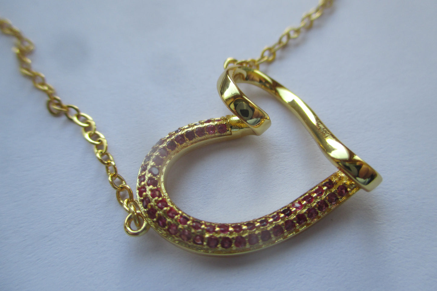 Gold plated curved Heart pendant with RED accents