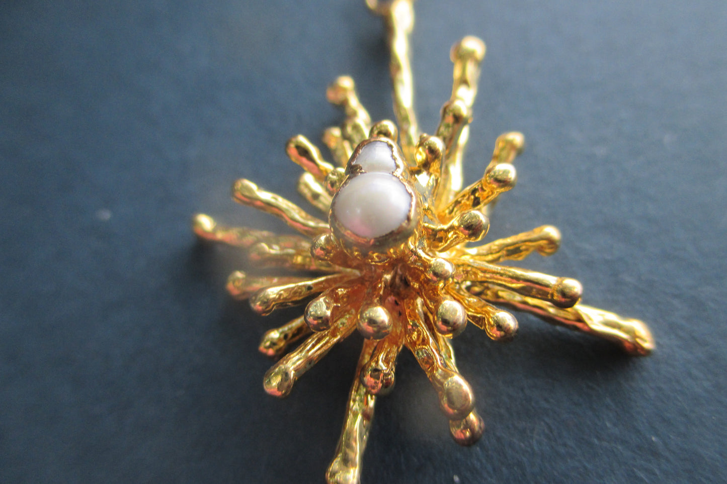 Gold plated pearl star pendant