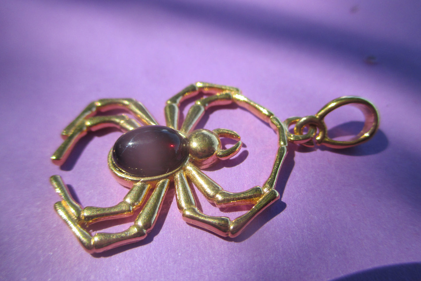 Amber spider pendant