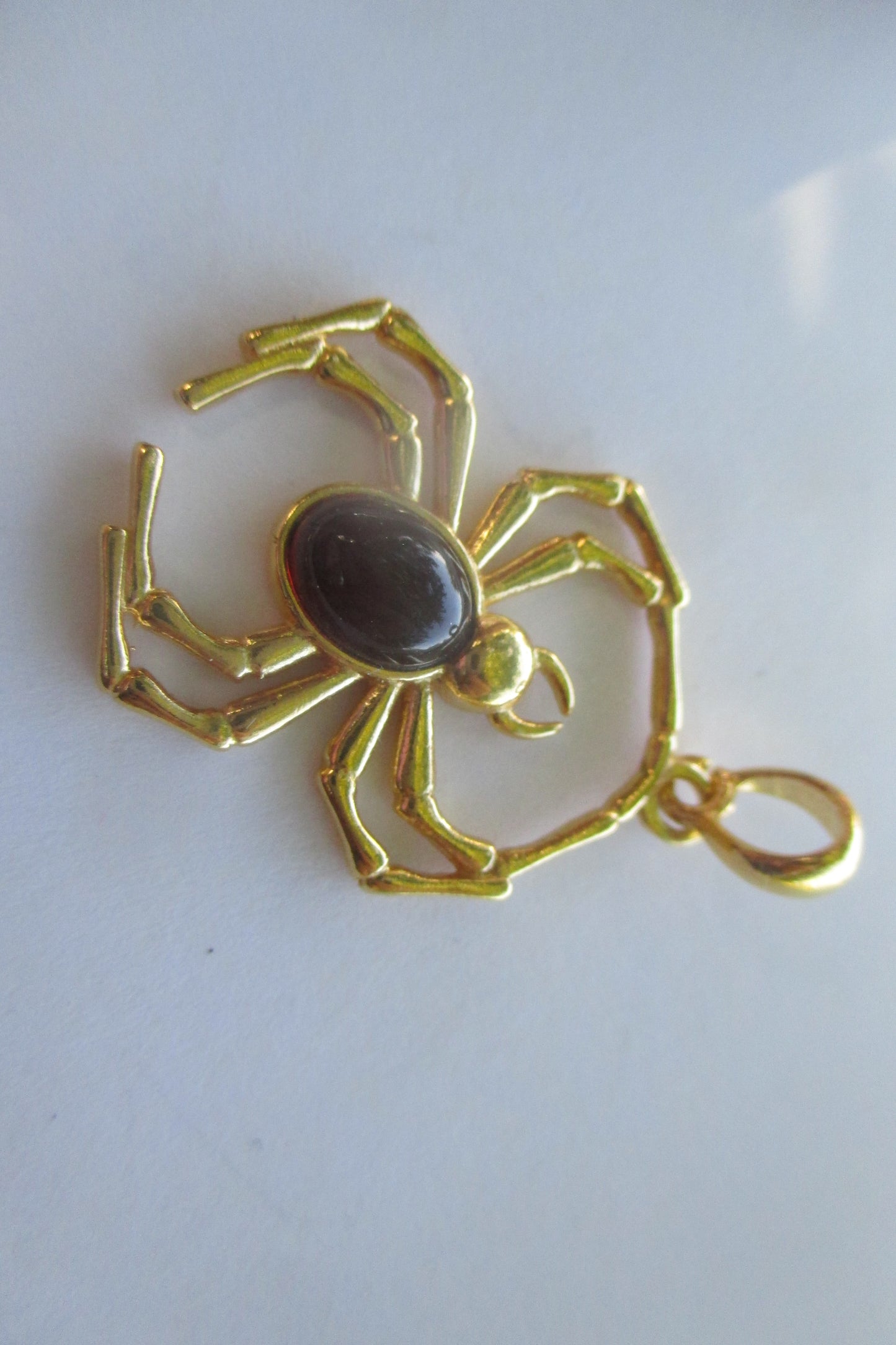 Amber spider pendant