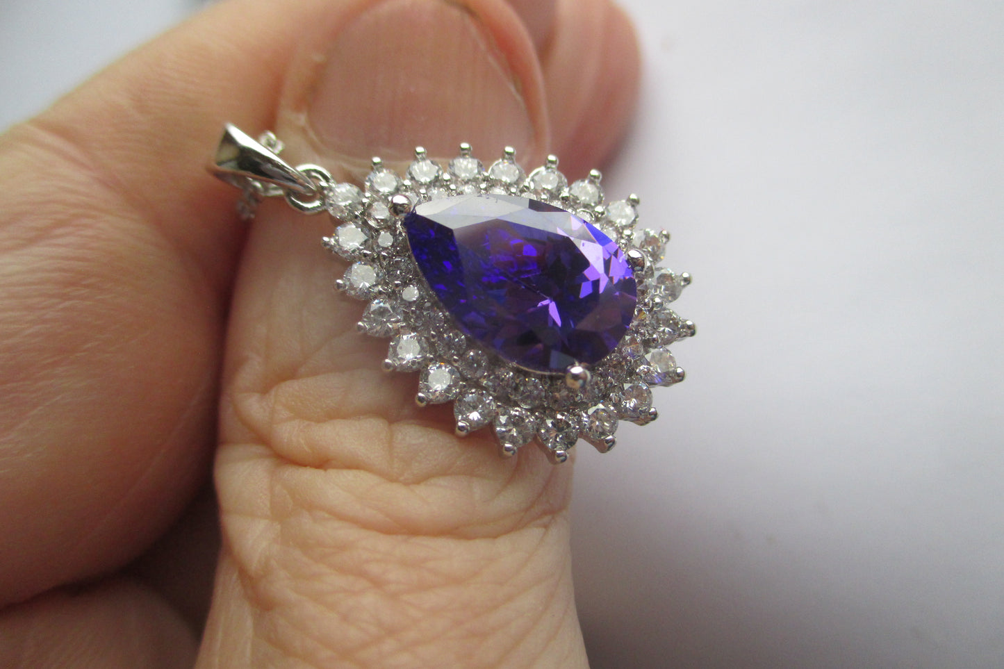 Pear violet stone silver pendant