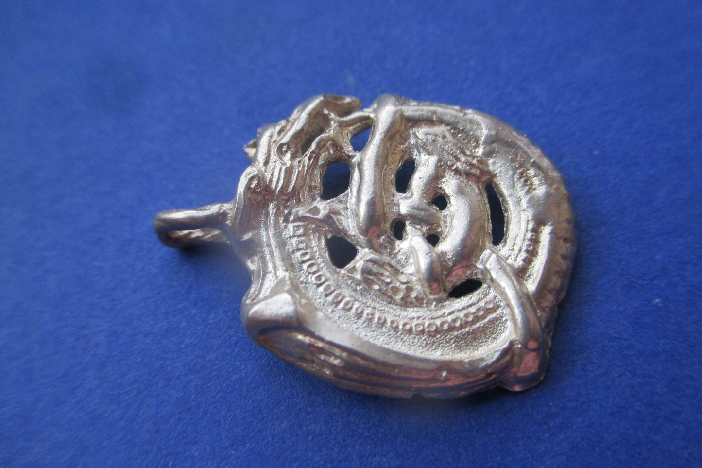 Silver dragon pendant