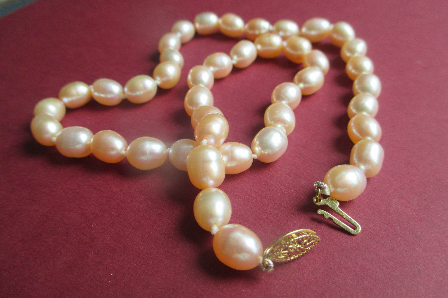 Pink pearl bracelet 14k gold clasp