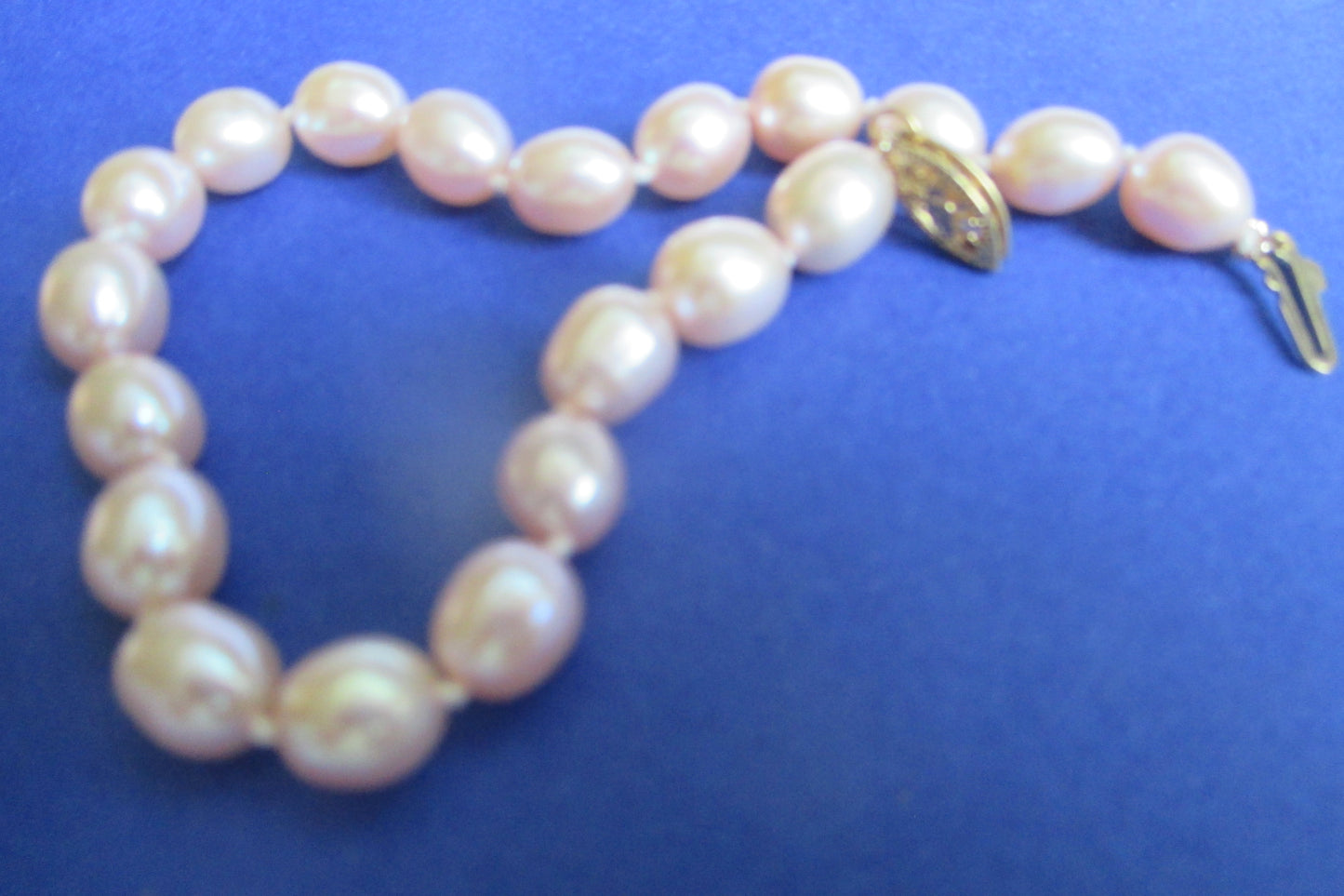 Pink pearl bracelet 14k gold clasp