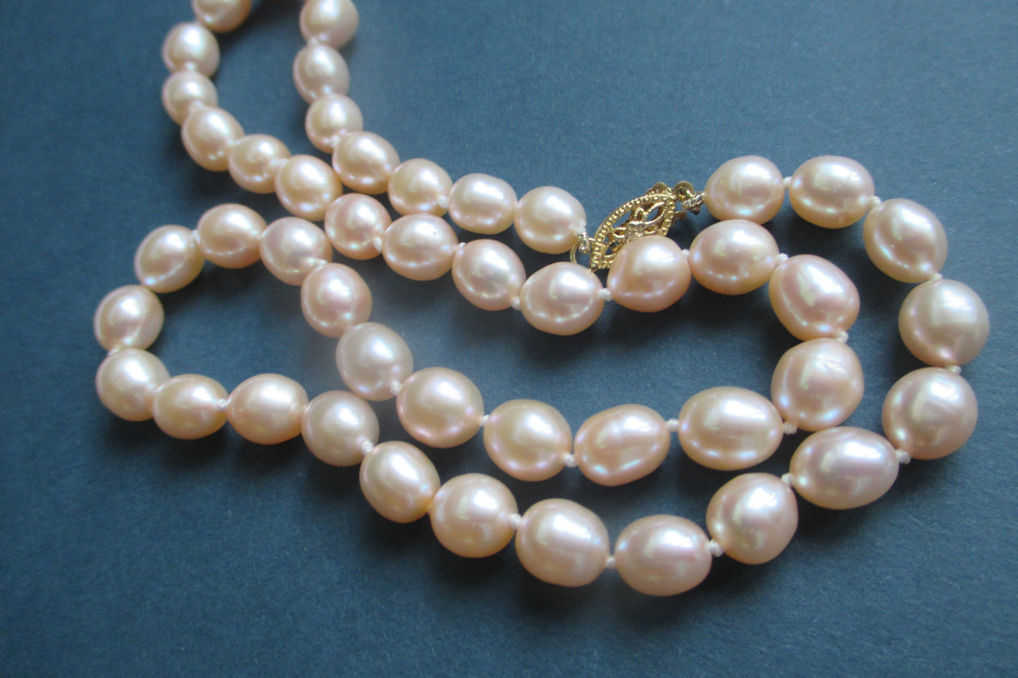 Pink pearl necklace with 14k gold clasp