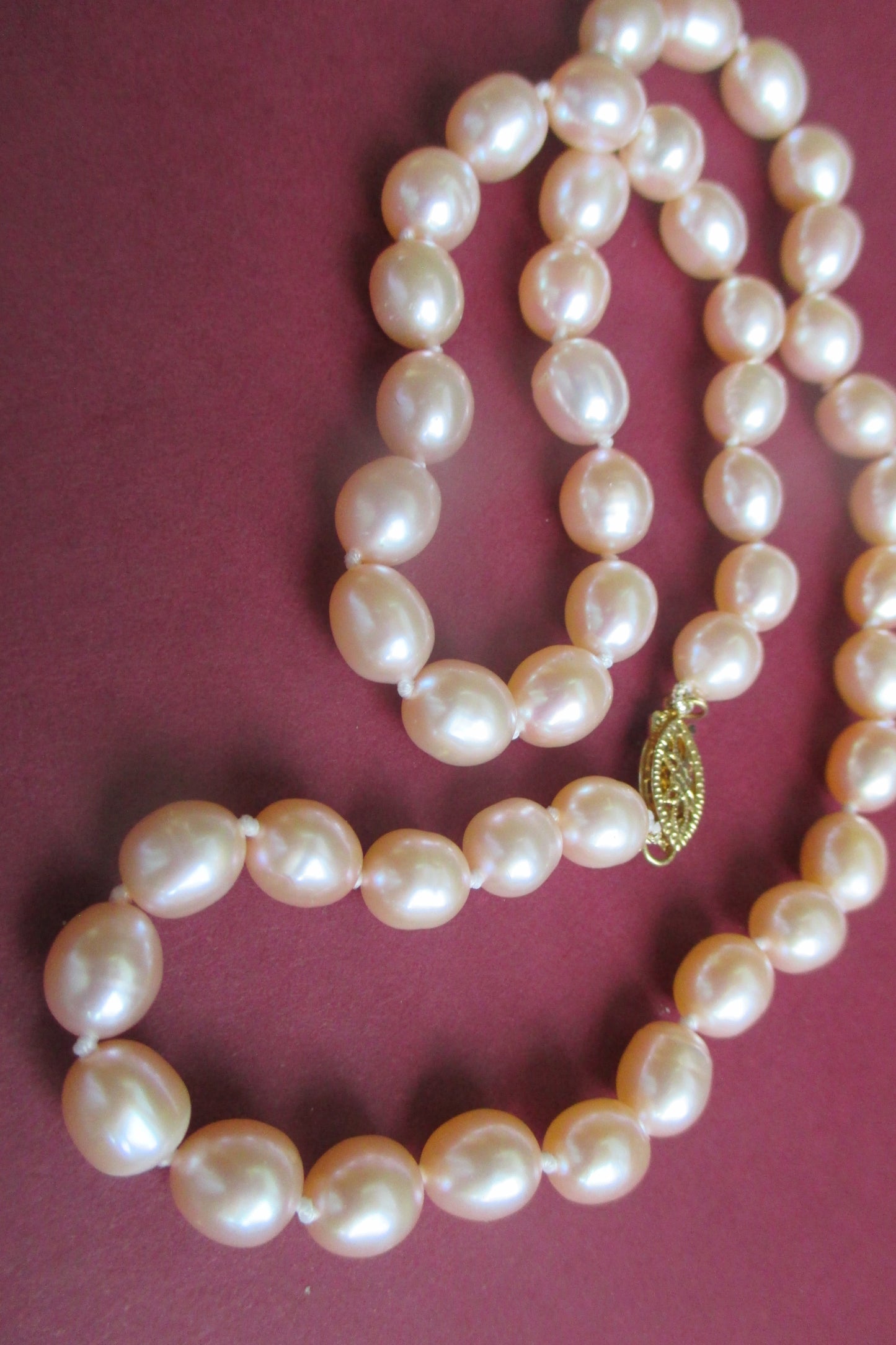 Pink pearl necklace with 14k gold clasp