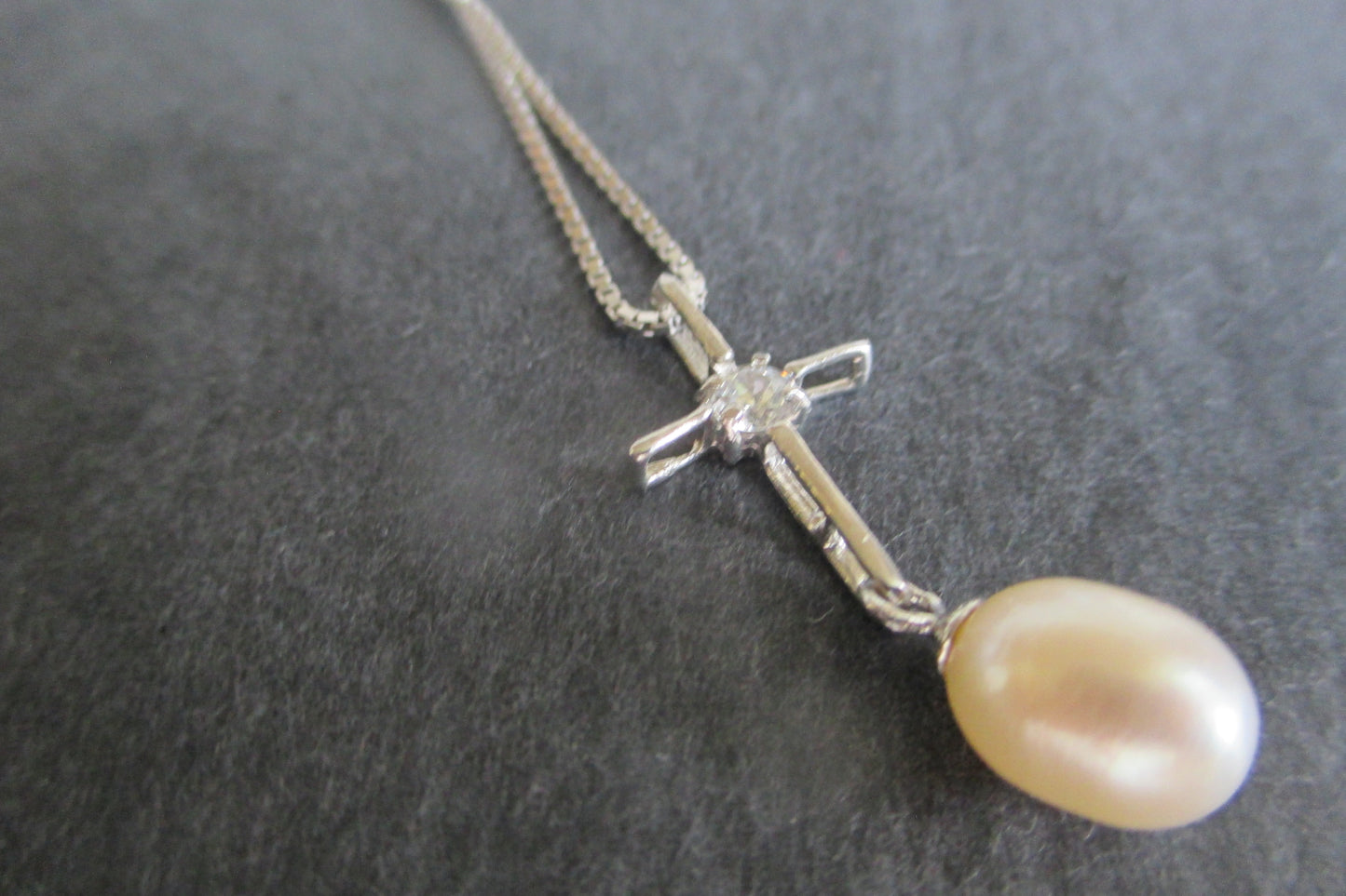 Pink pearl cross pendant