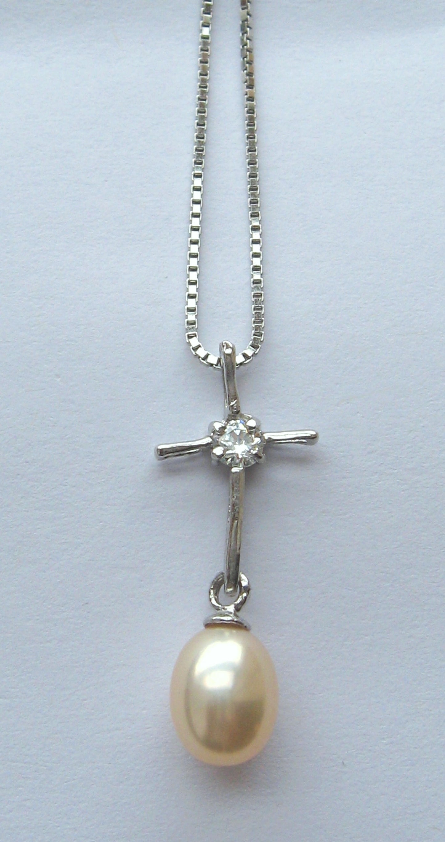 Pink pearl cross pendant