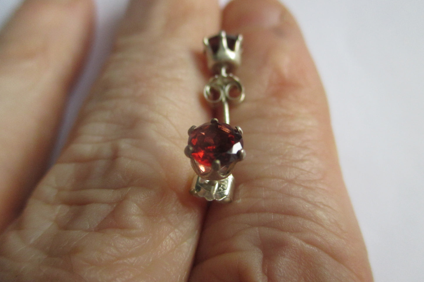 Silver stud garnet earrings