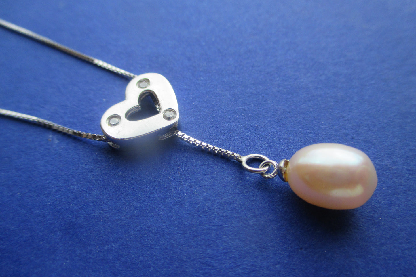 Pearl heart pendant