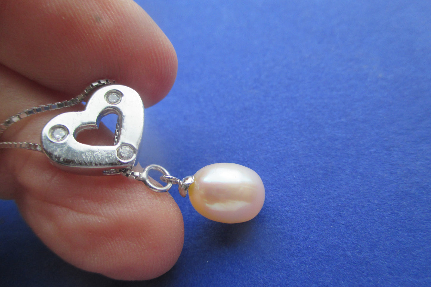 Heart and pearl pendant