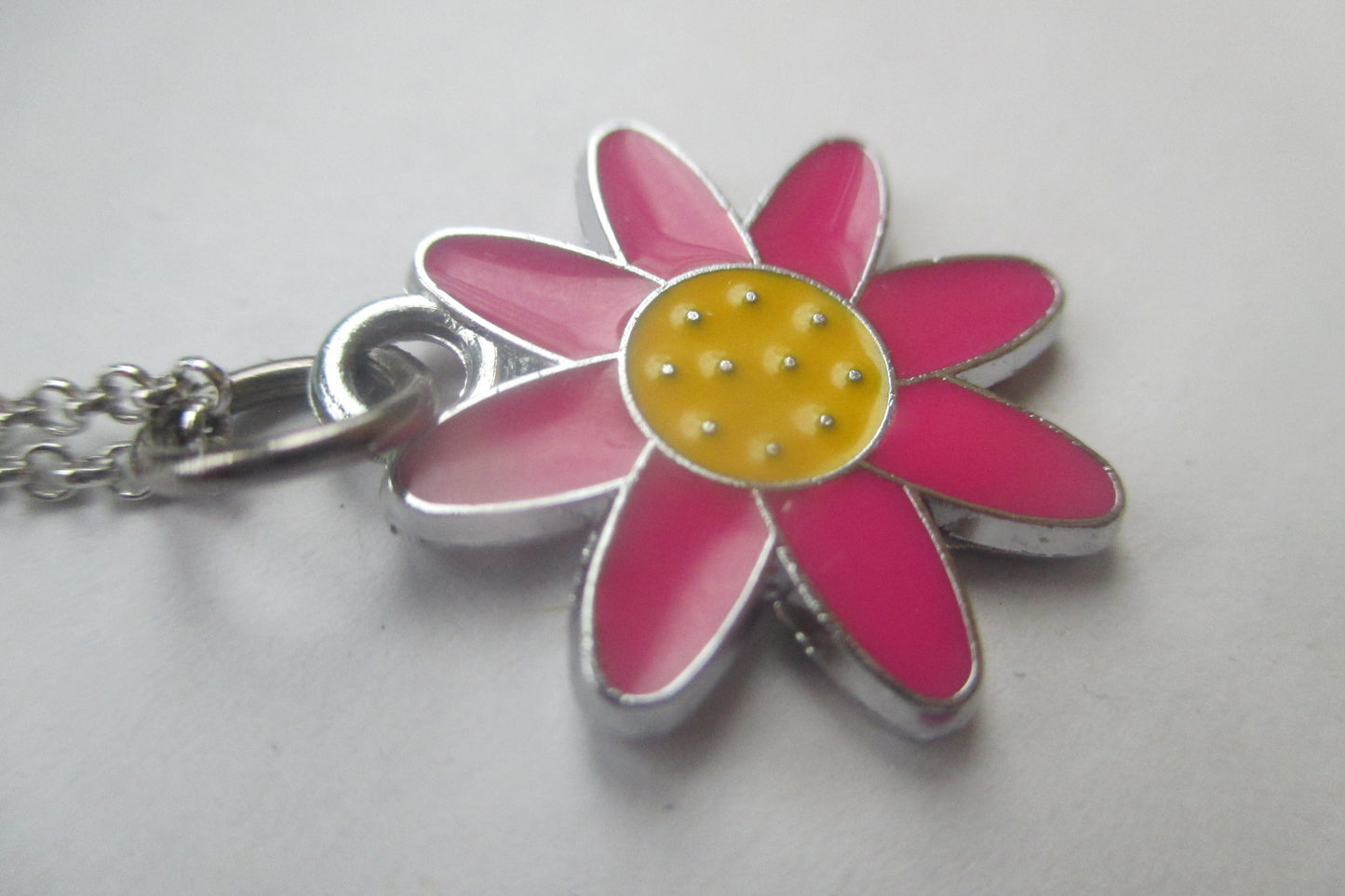 Enamel flower pendant