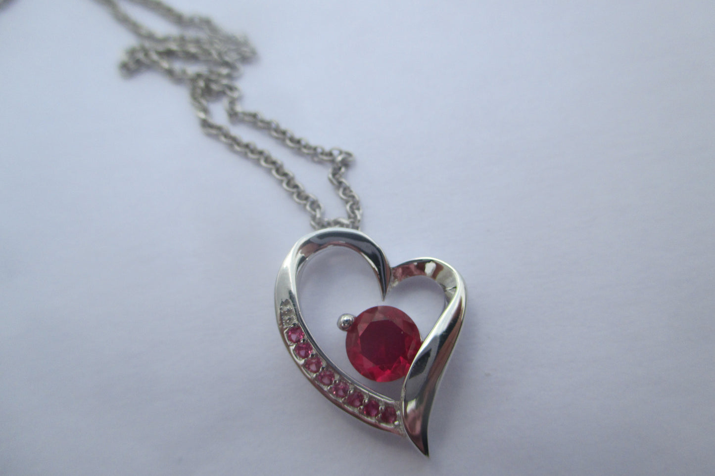 Silver garnet heart pendant