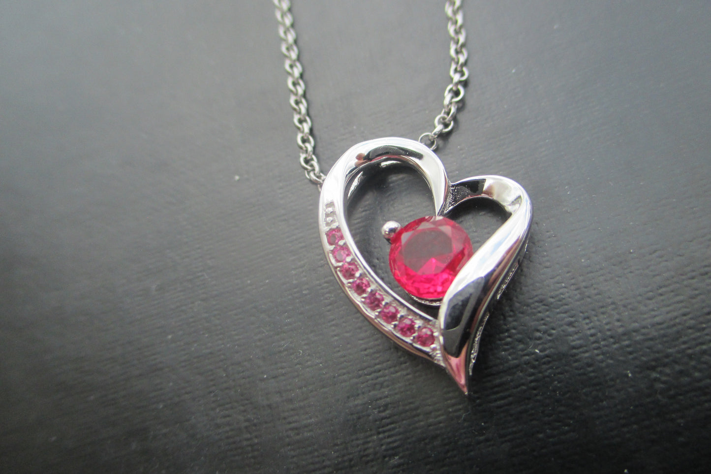 Silver garnet heart pendant