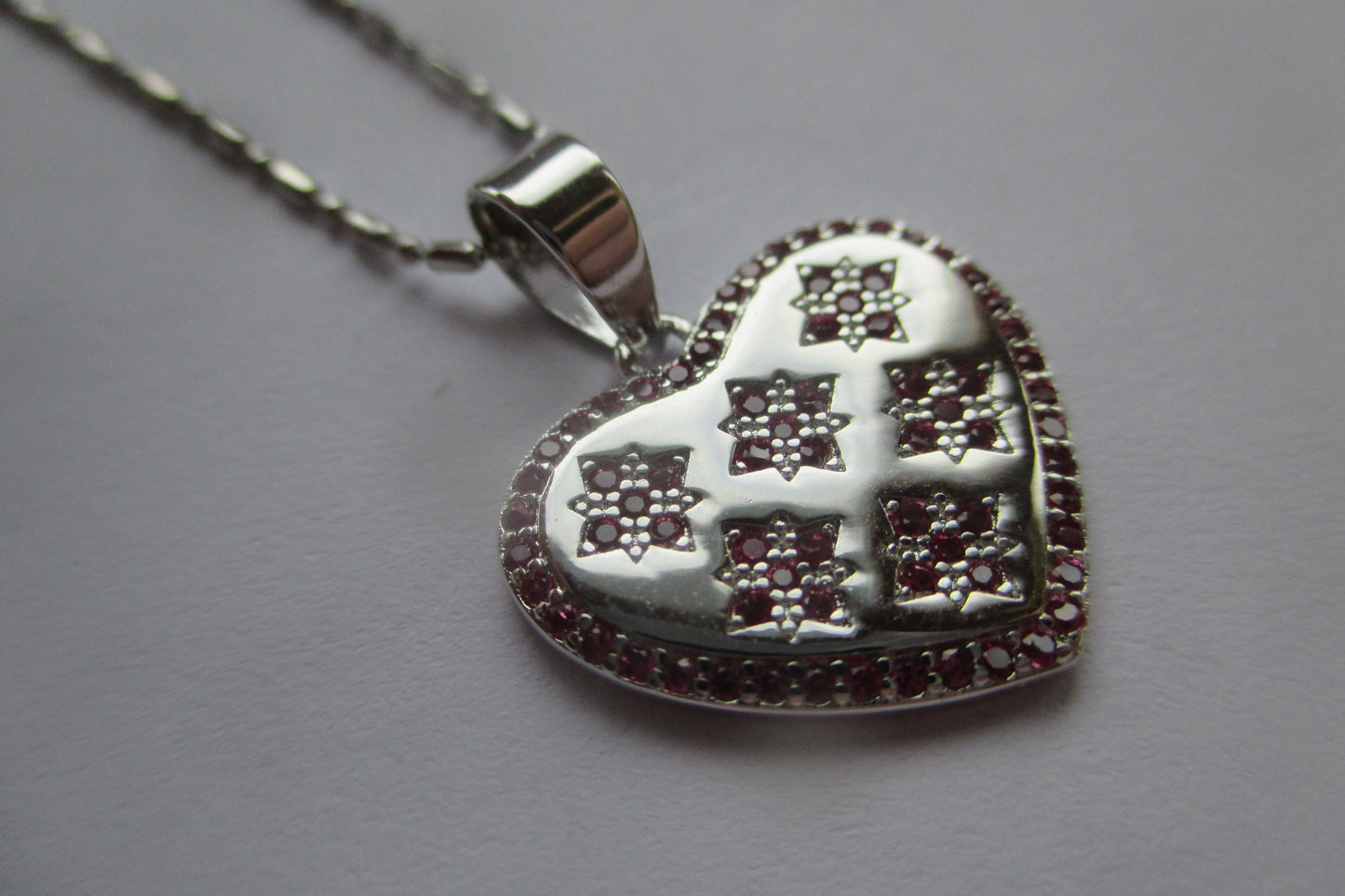 Silver heart with red accents pendant