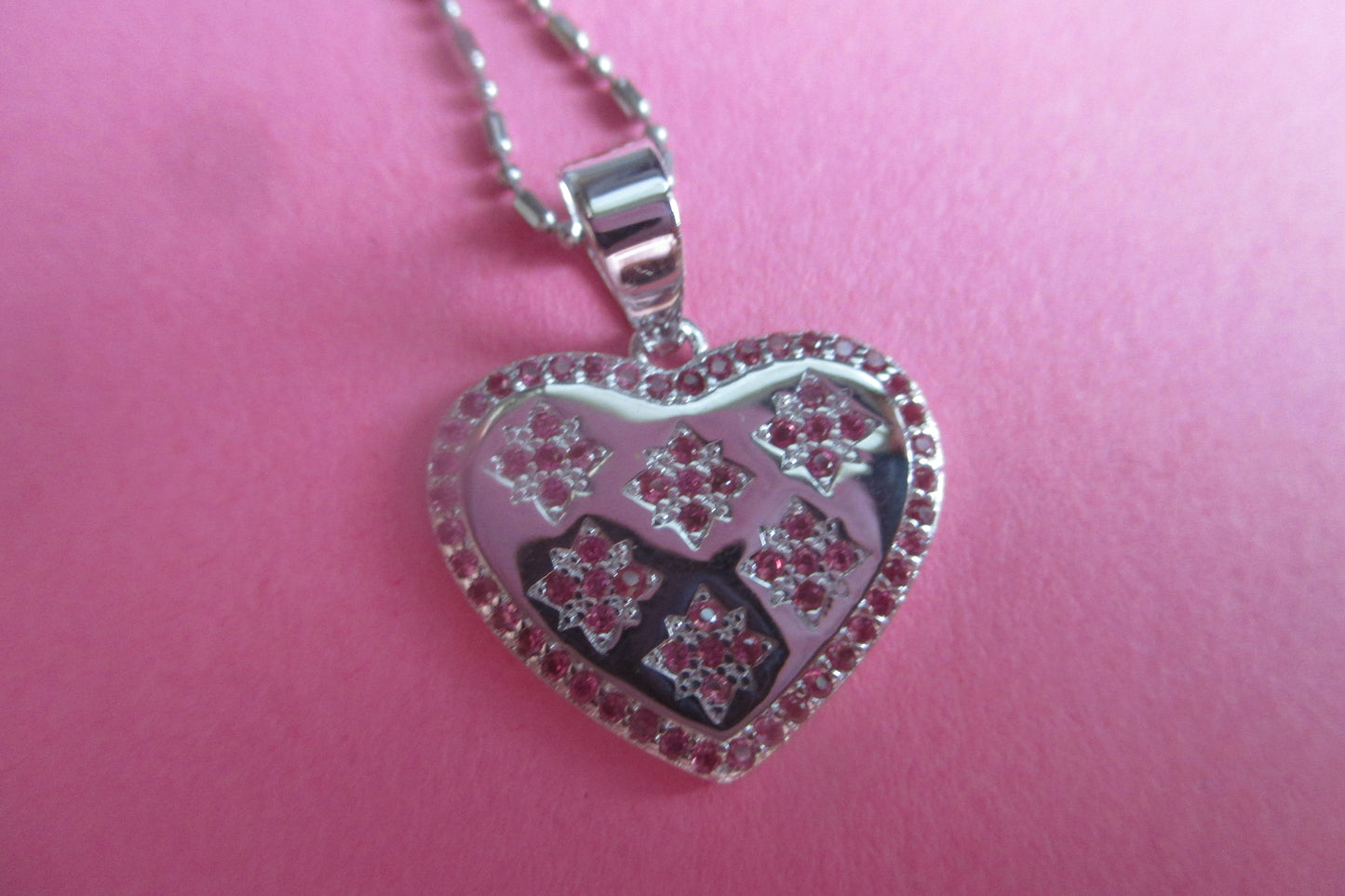 Silver heart with red accents pendant