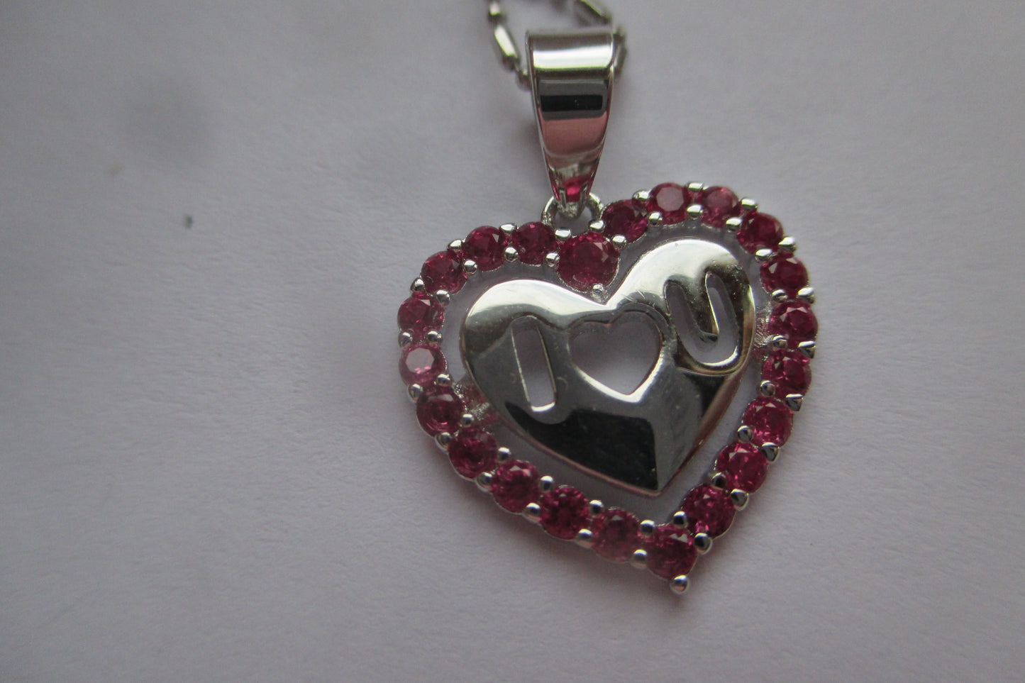 Silver heart with red accents pendant