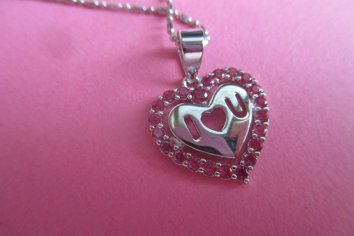 Silver heart with red accents pendant