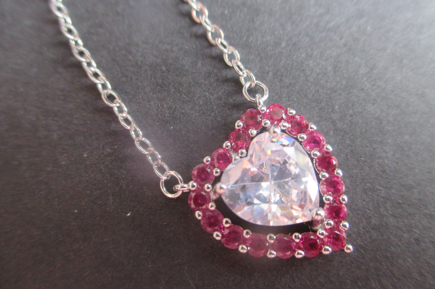 Silver heart with red accents pendant