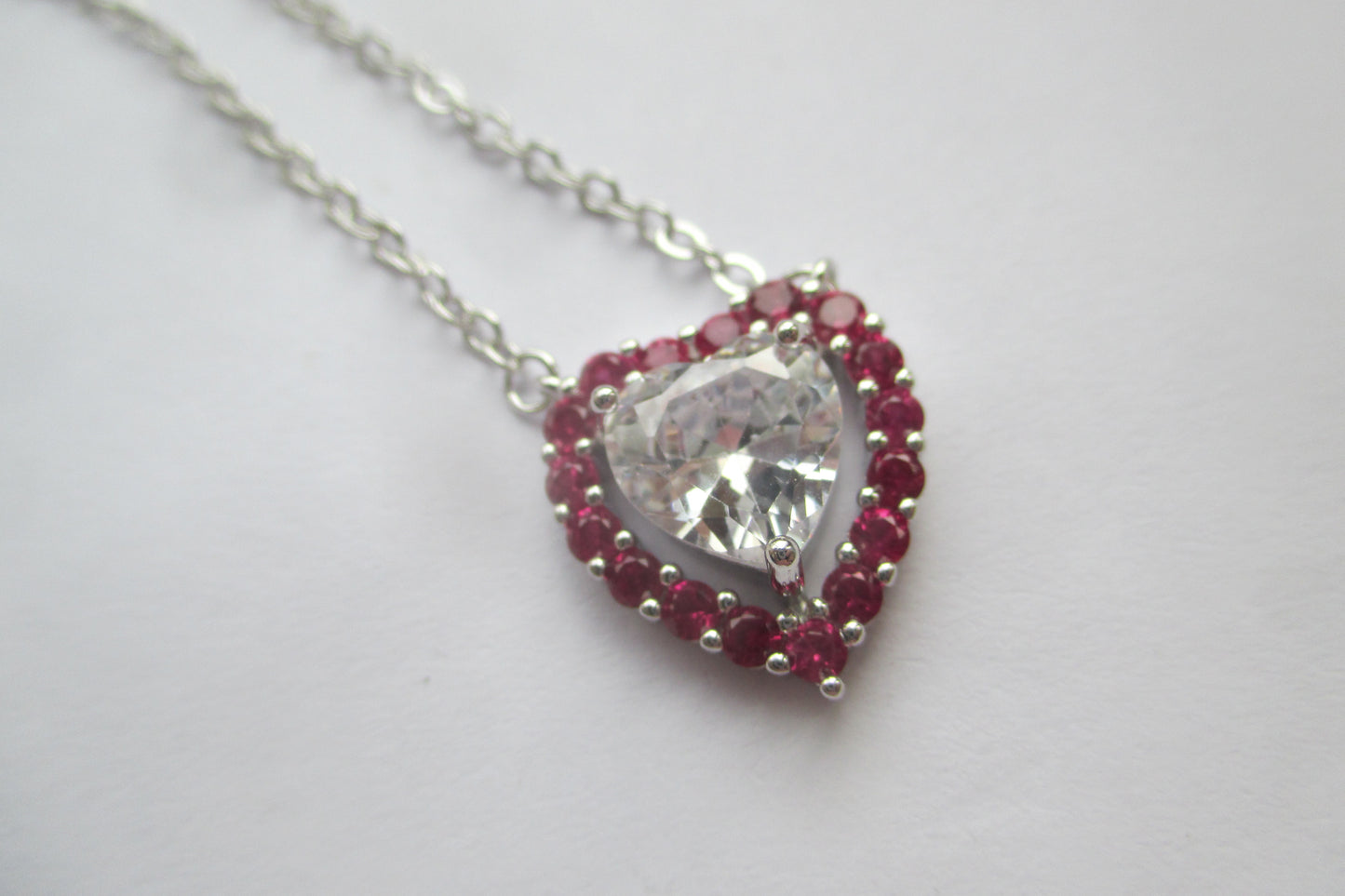 Silver heart with red accents pendant