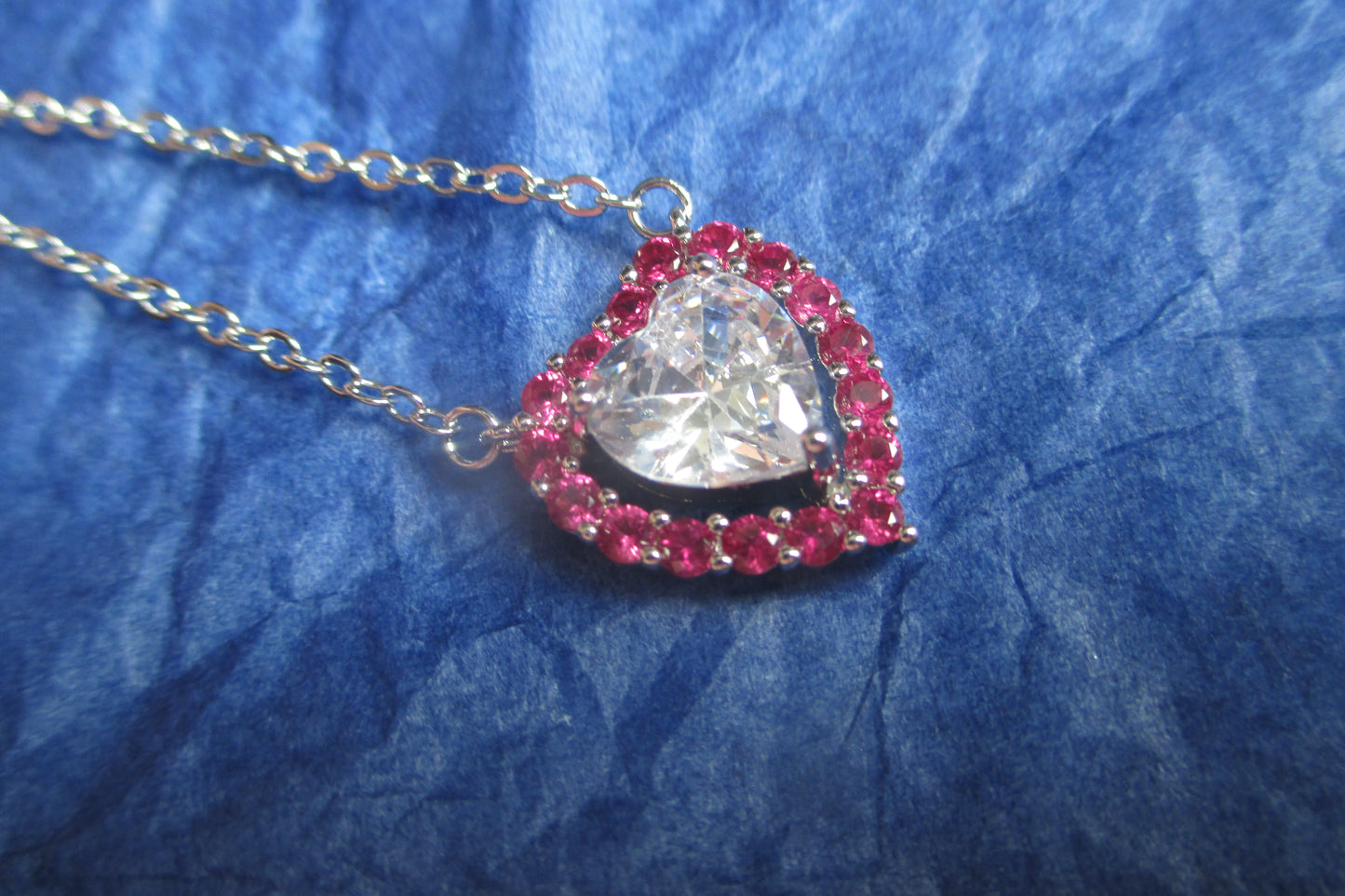 Silver heart with red accents pendant