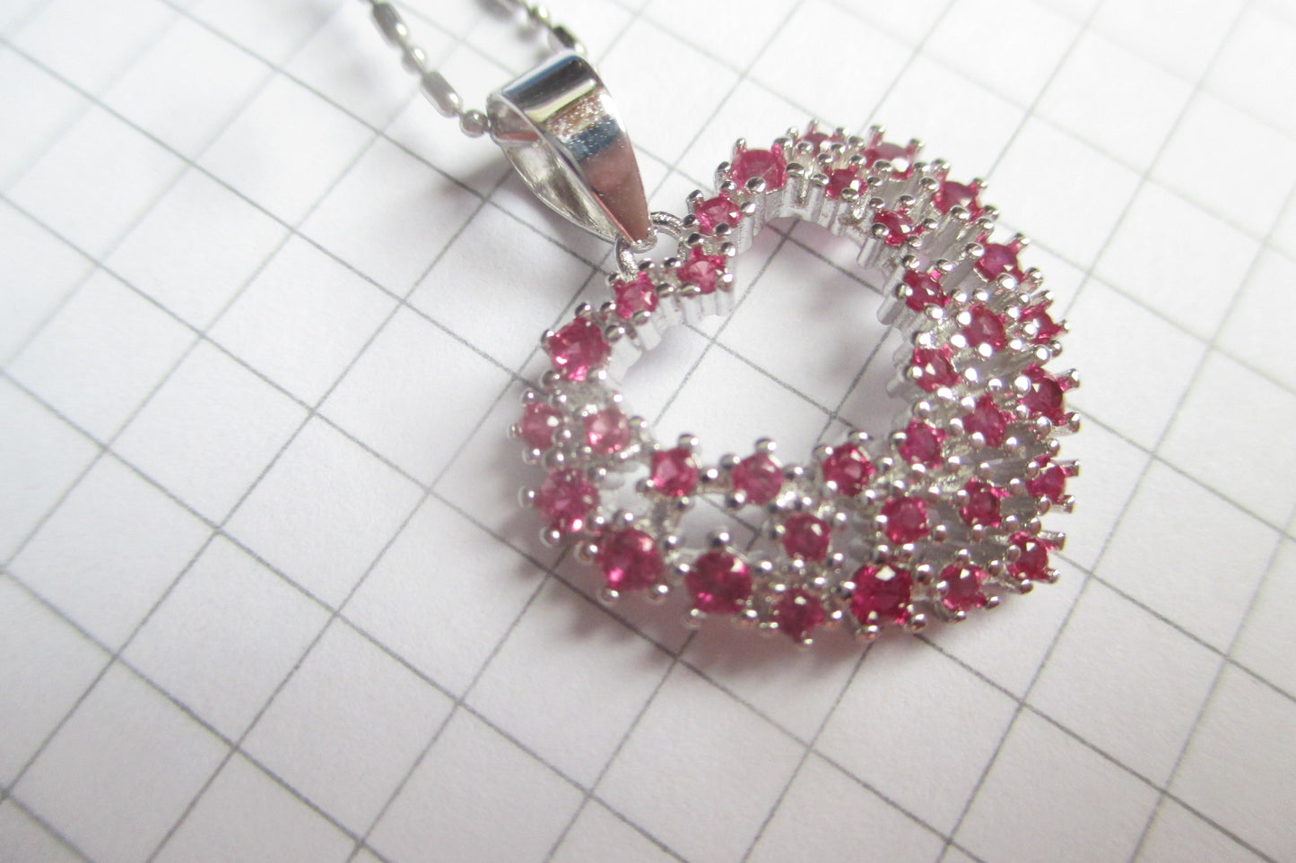 Silver heart with red accents pendant