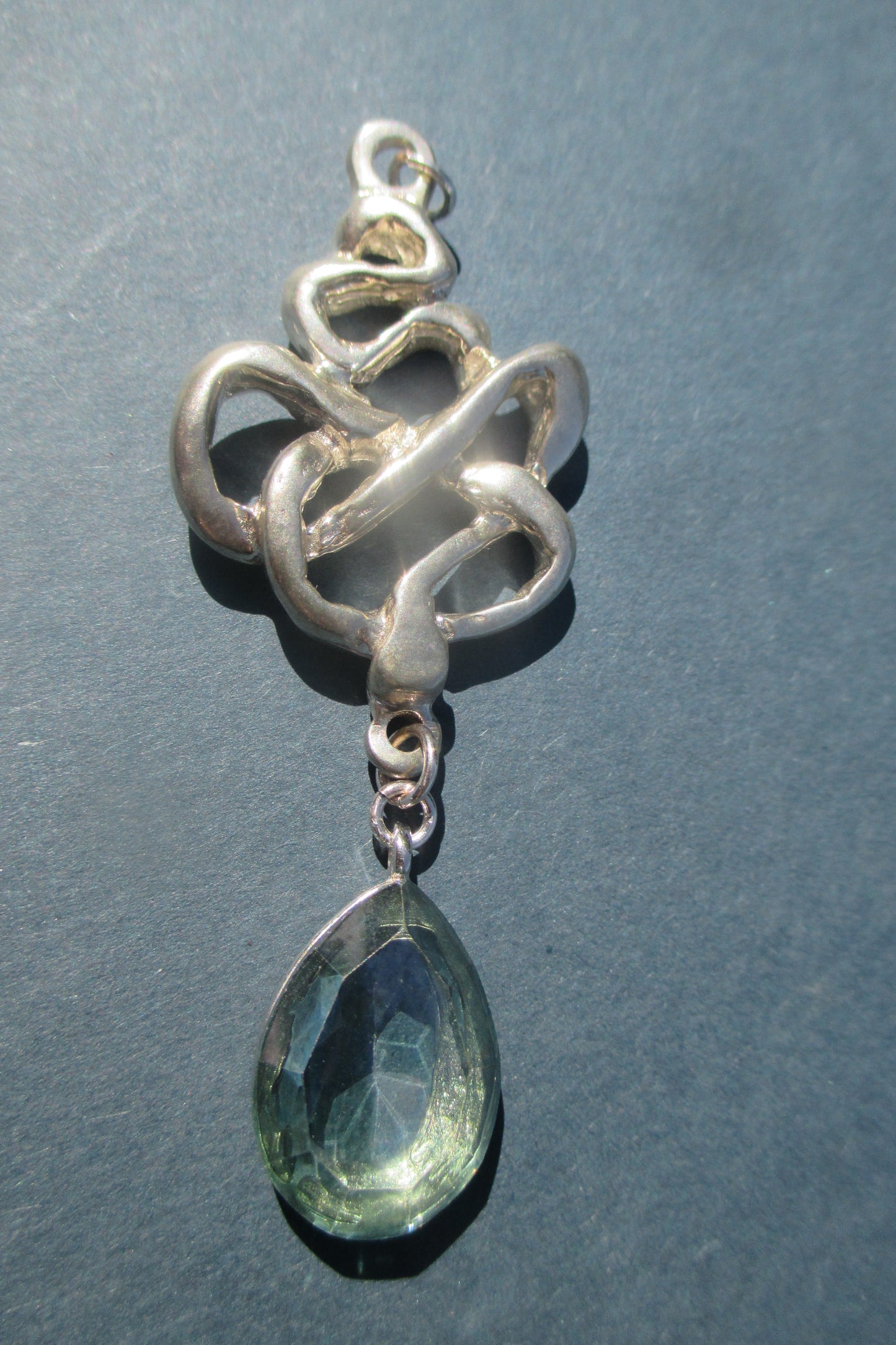 Silver snake with venetian glass drop pendant