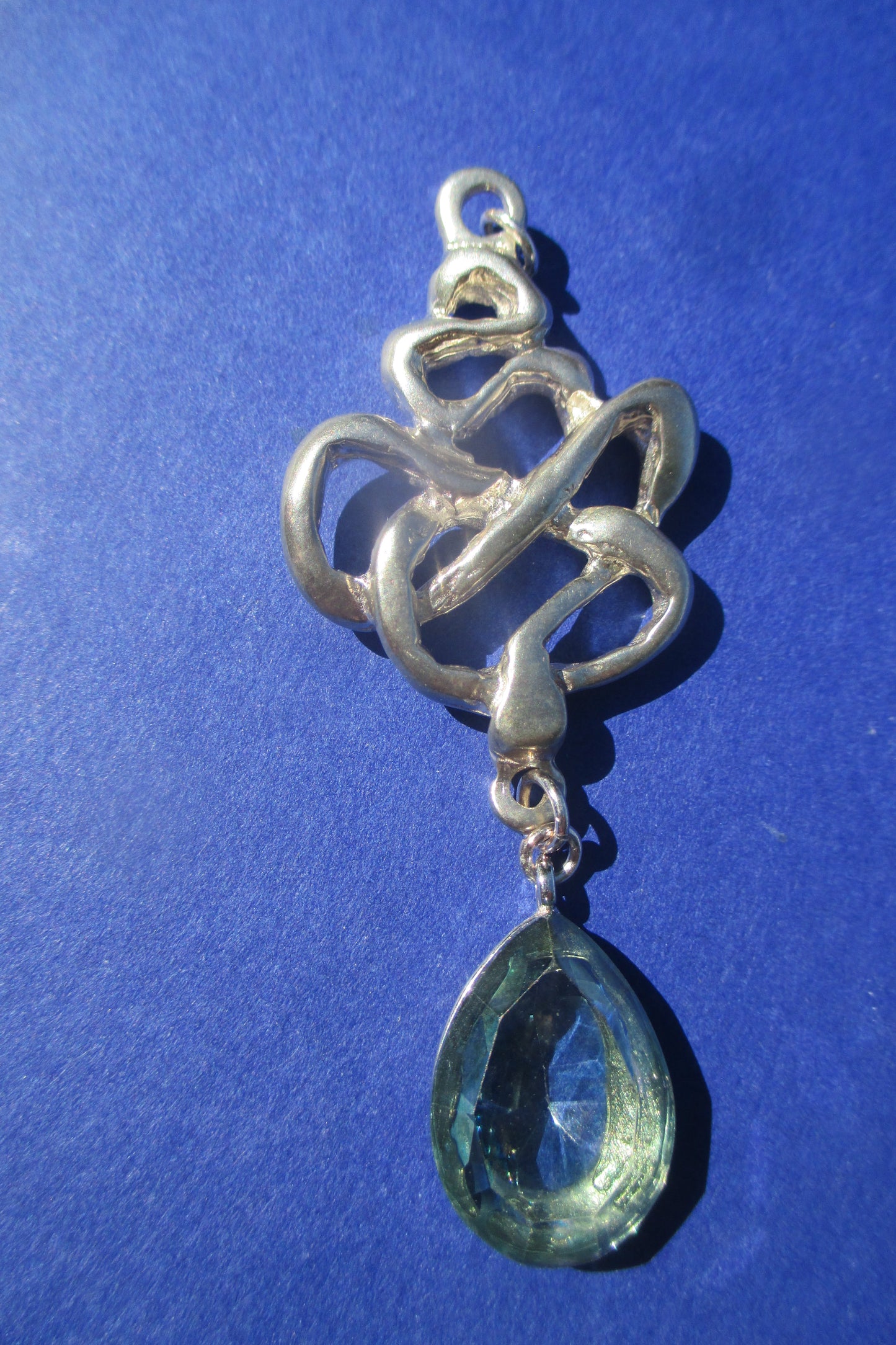 Silver snake with venetian glass drop pendant