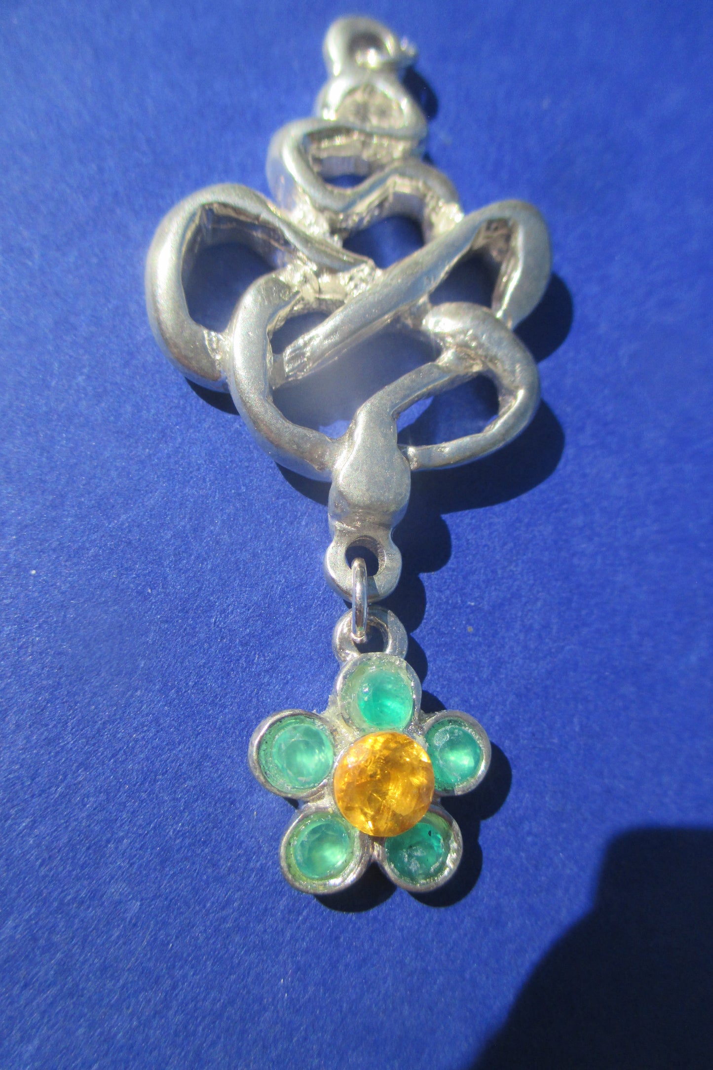 Silver snake with flower drop pendant