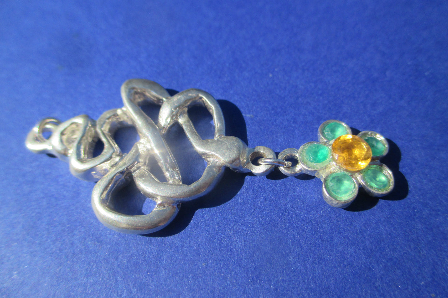 Silver snake with flower drop pendant