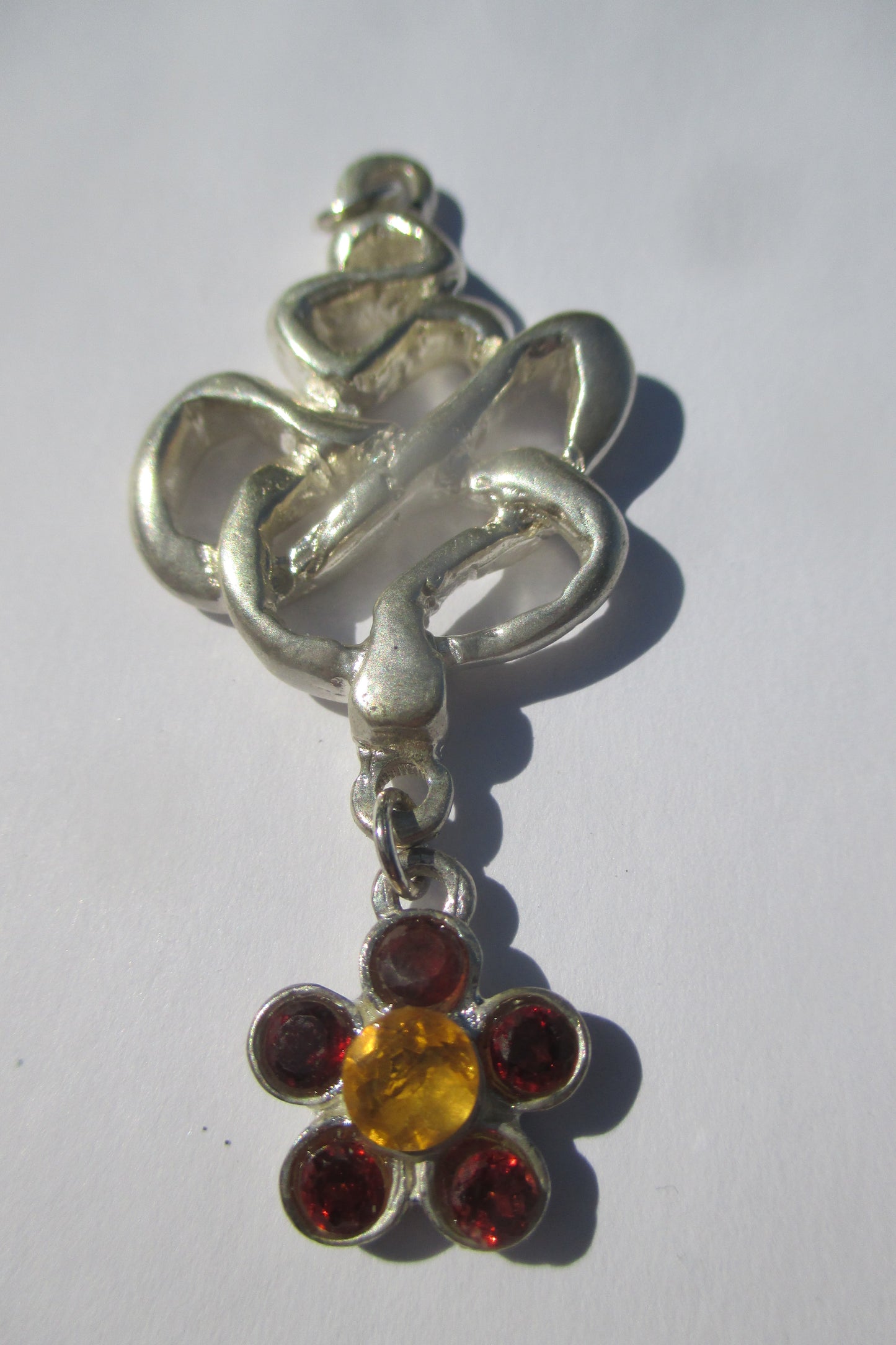 Silver snake with flower drop pendant