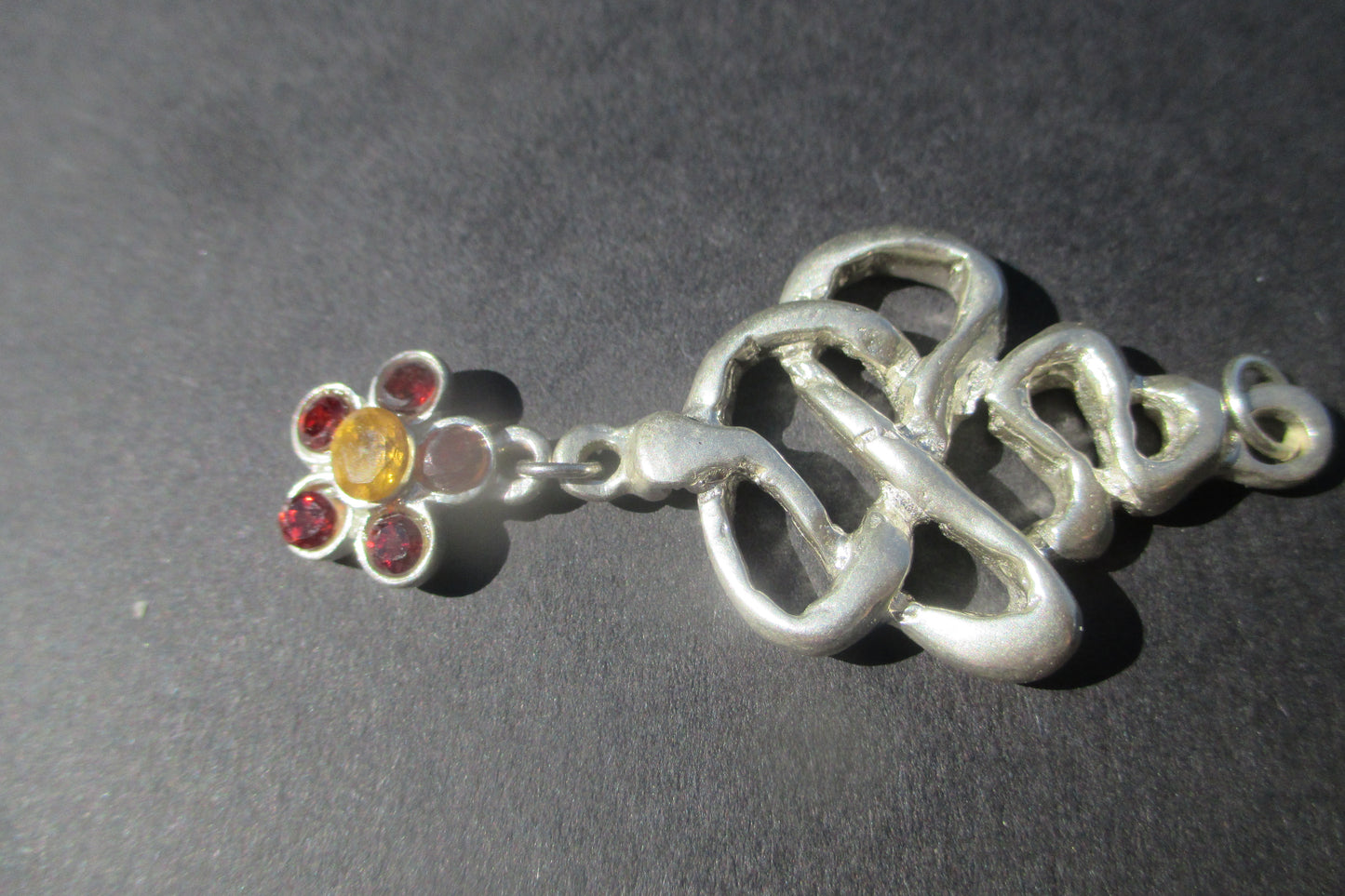 Silver snake with flower drop pendant