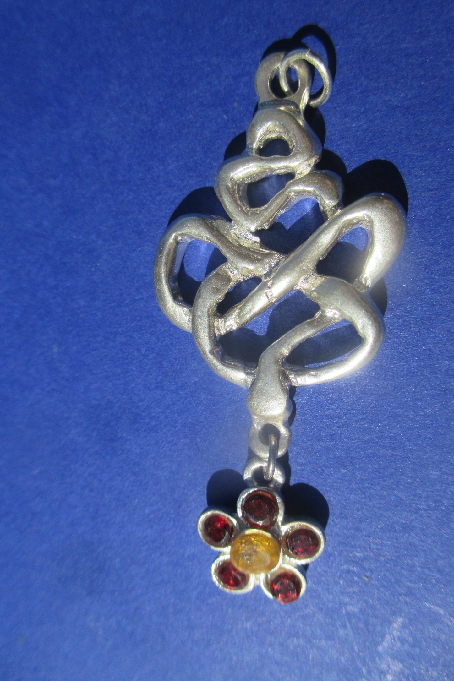 Silver snake with flower drop pendant