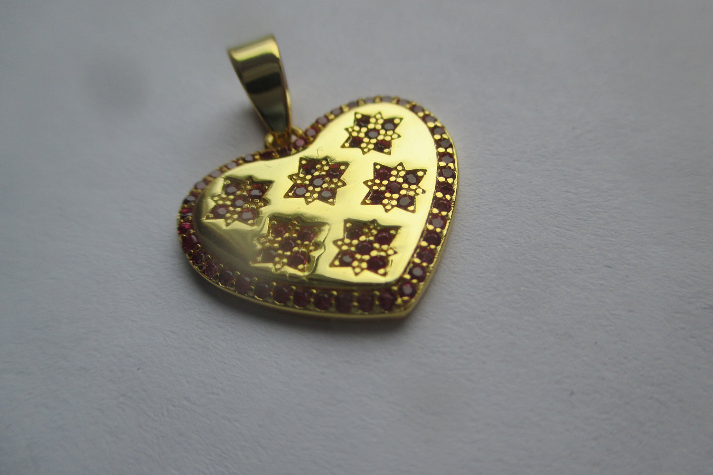 Gold plated silver pendant with accents