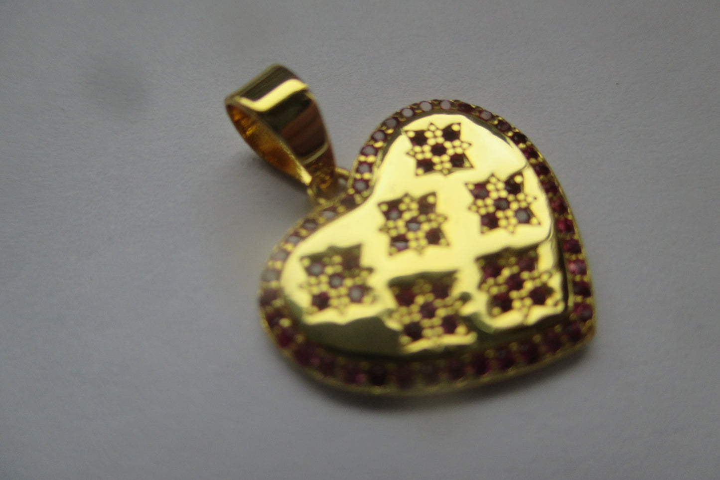 Gold plated silver pendant with accents