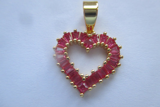 Gold plated HEART pendant with red stones.