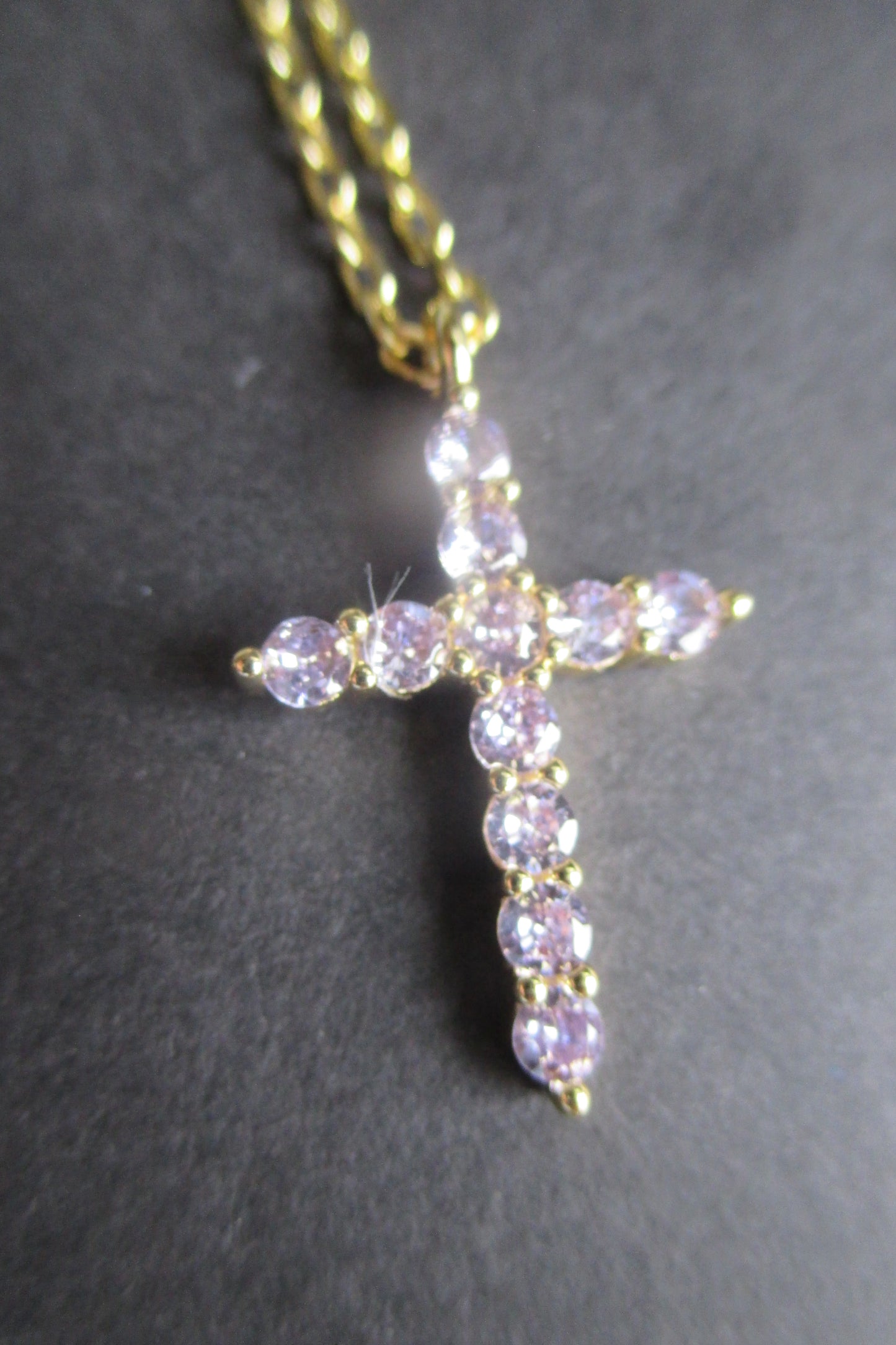 Gold plated violet stone cross pendant