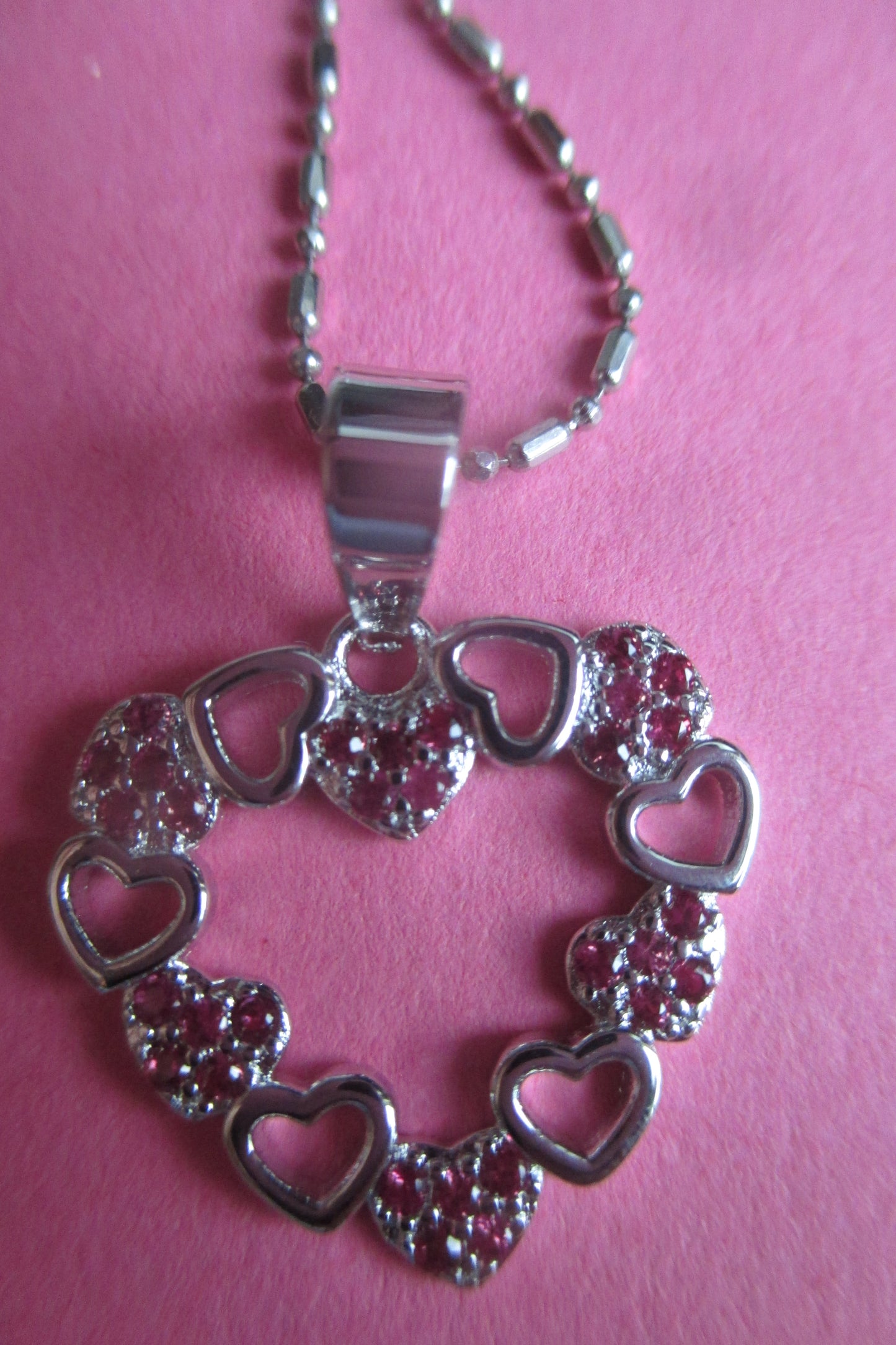 Silver hearts  with red accent pendant