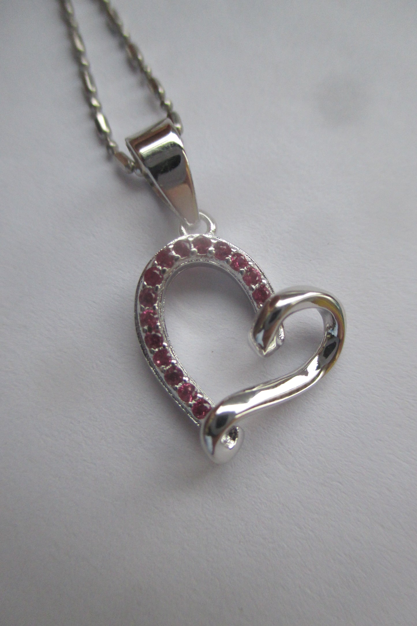 Silver heart with red accent pendant