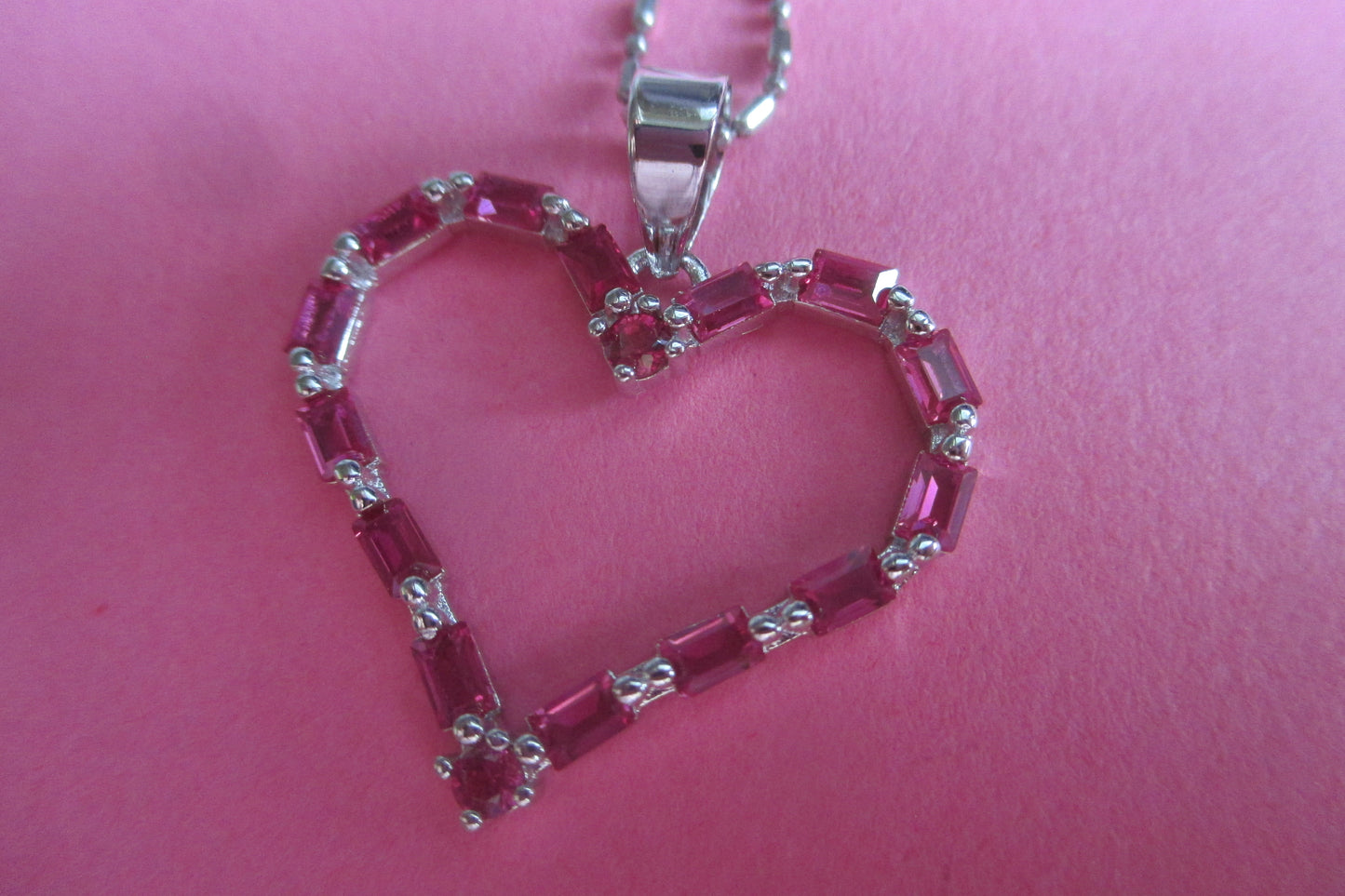 Silver heart with red accent pendant