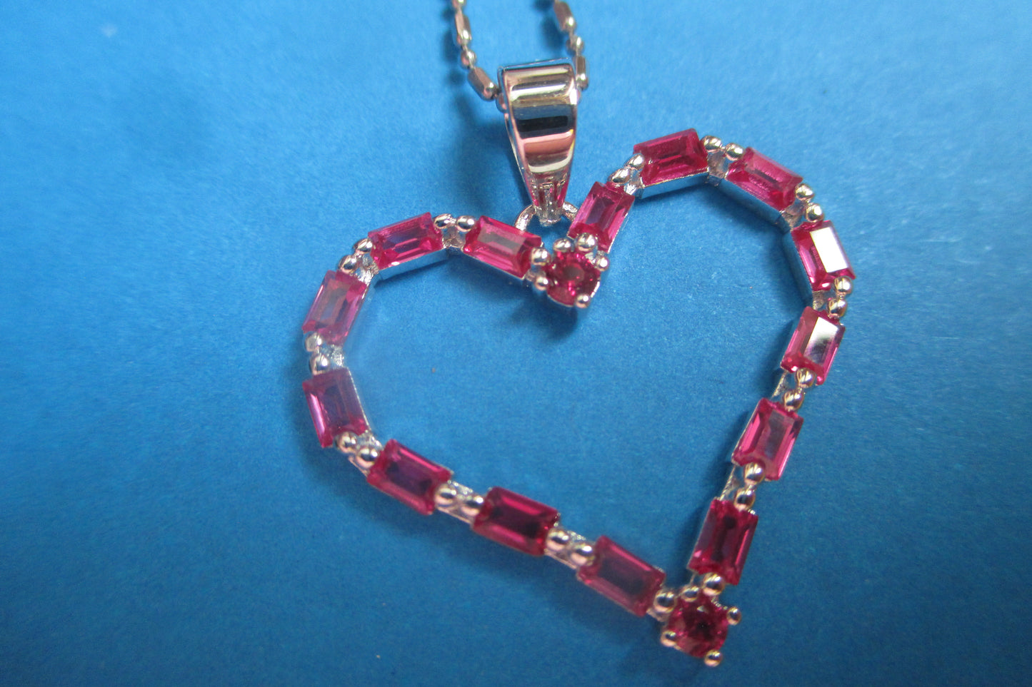 Silver heart with red accent pendant