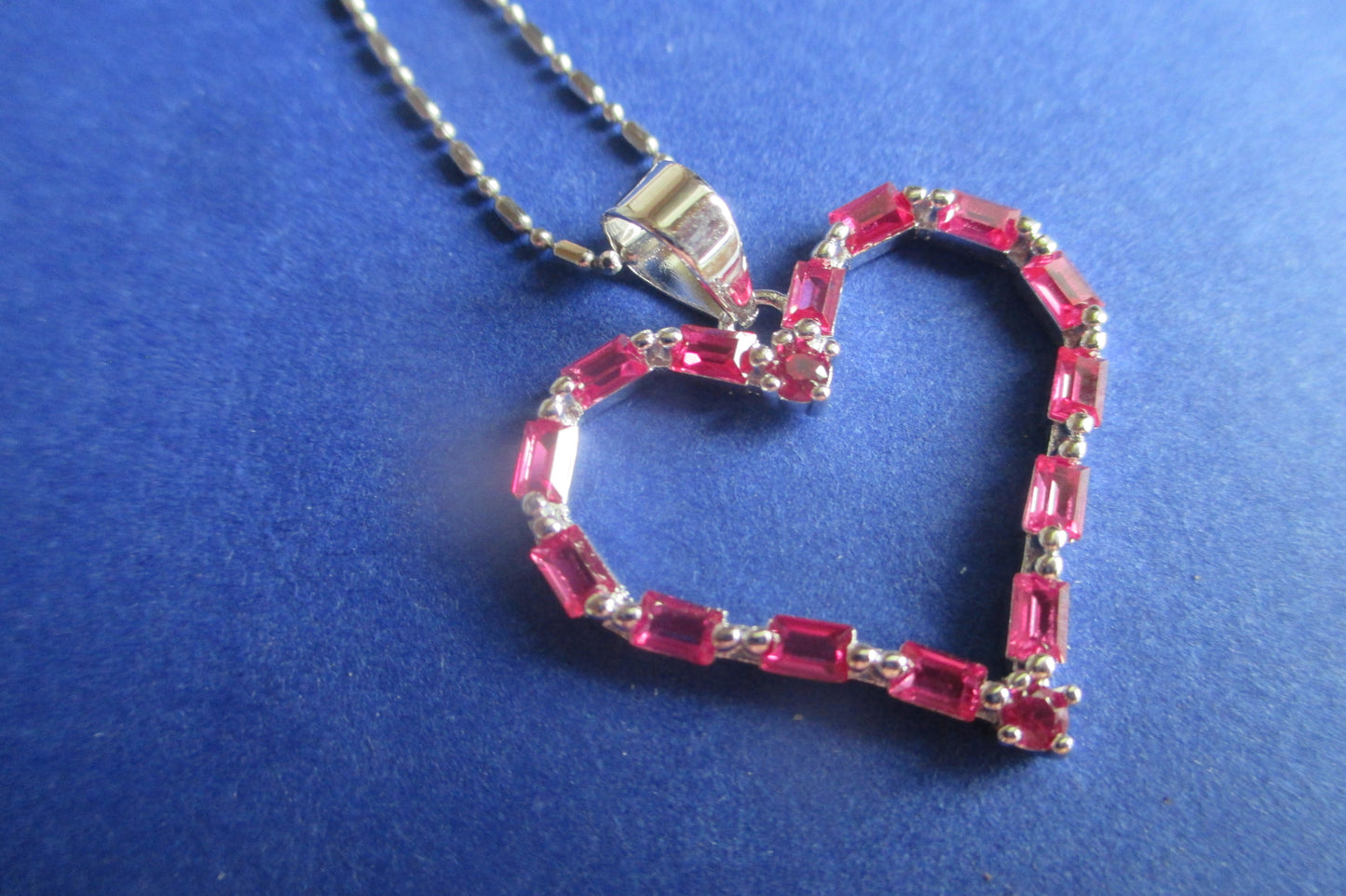 Silver heart with red accent pendant