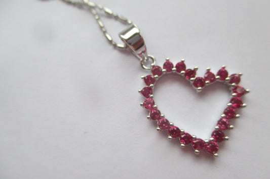 Silver heart with red accents pendant