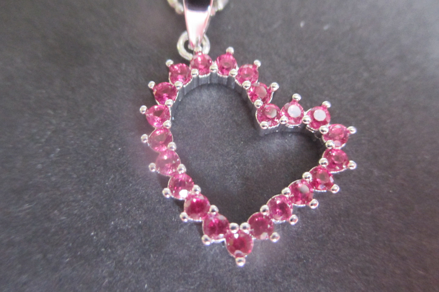 Silver heart with red accents pendant