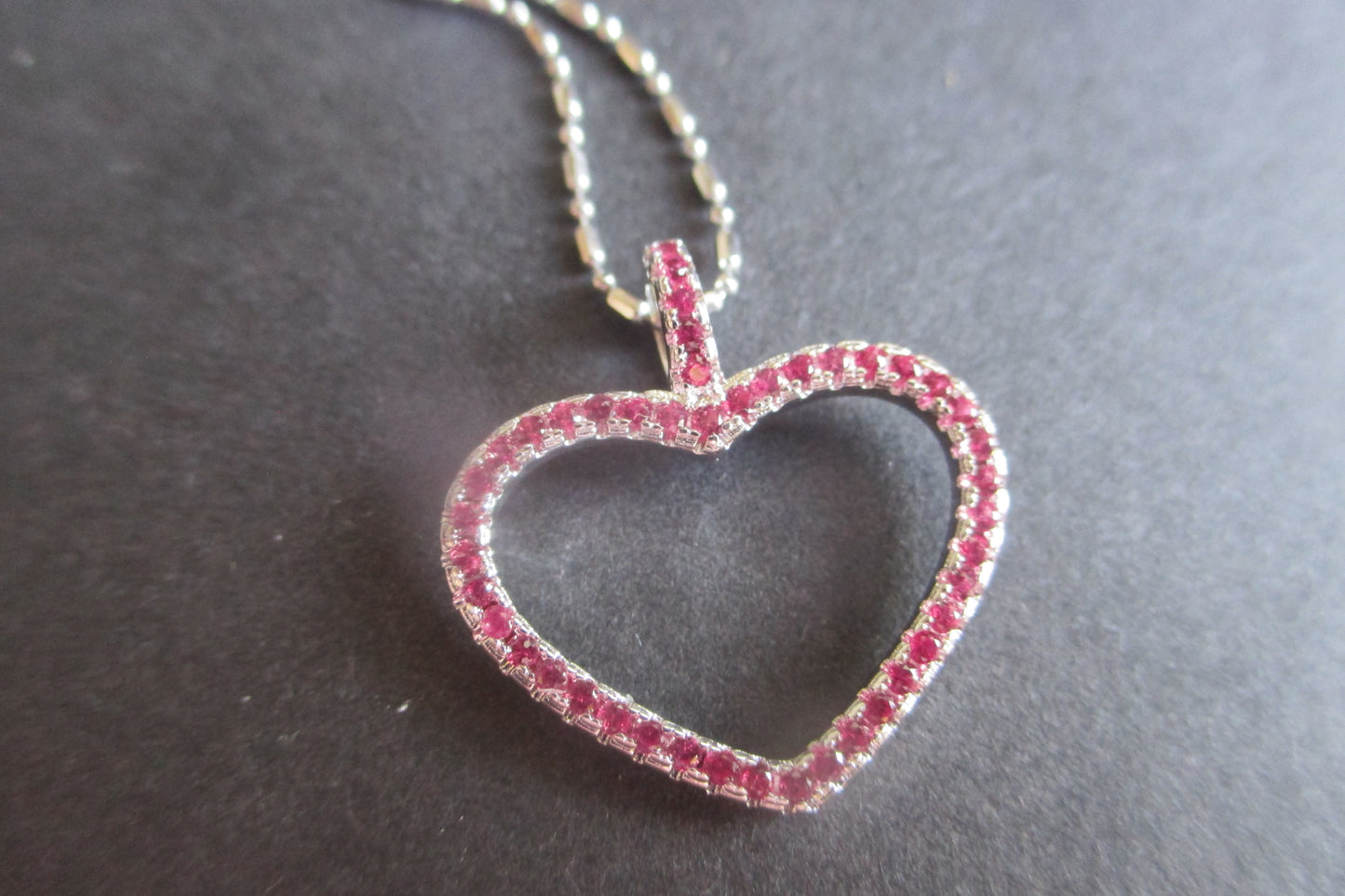 Silver heart with red accents pendant