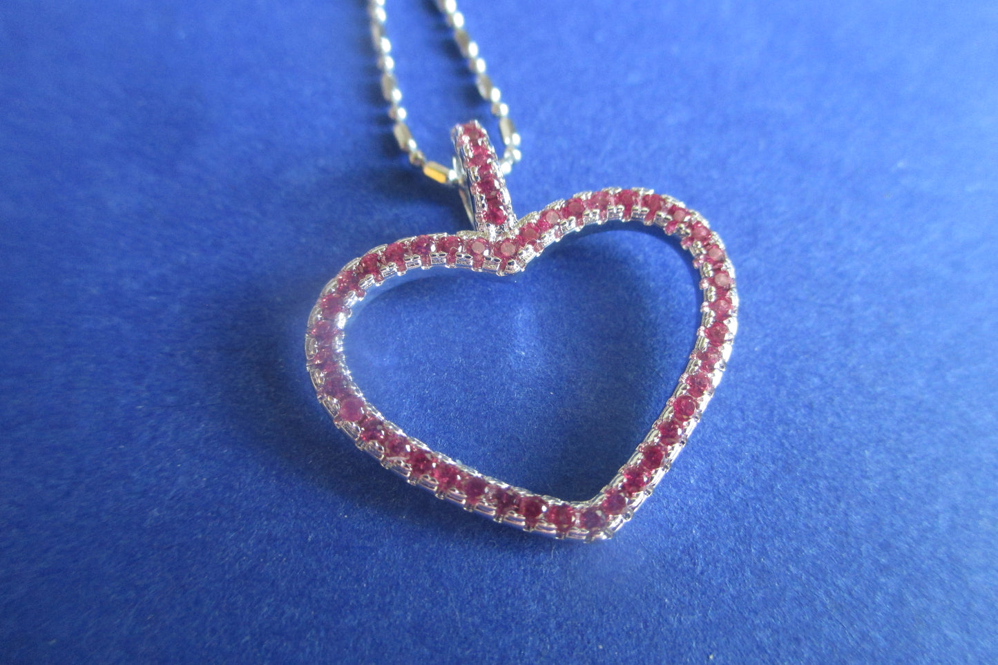 Silver heart with red accents pendant