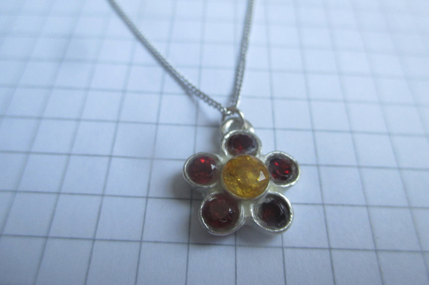 Silver flower garnet pendant